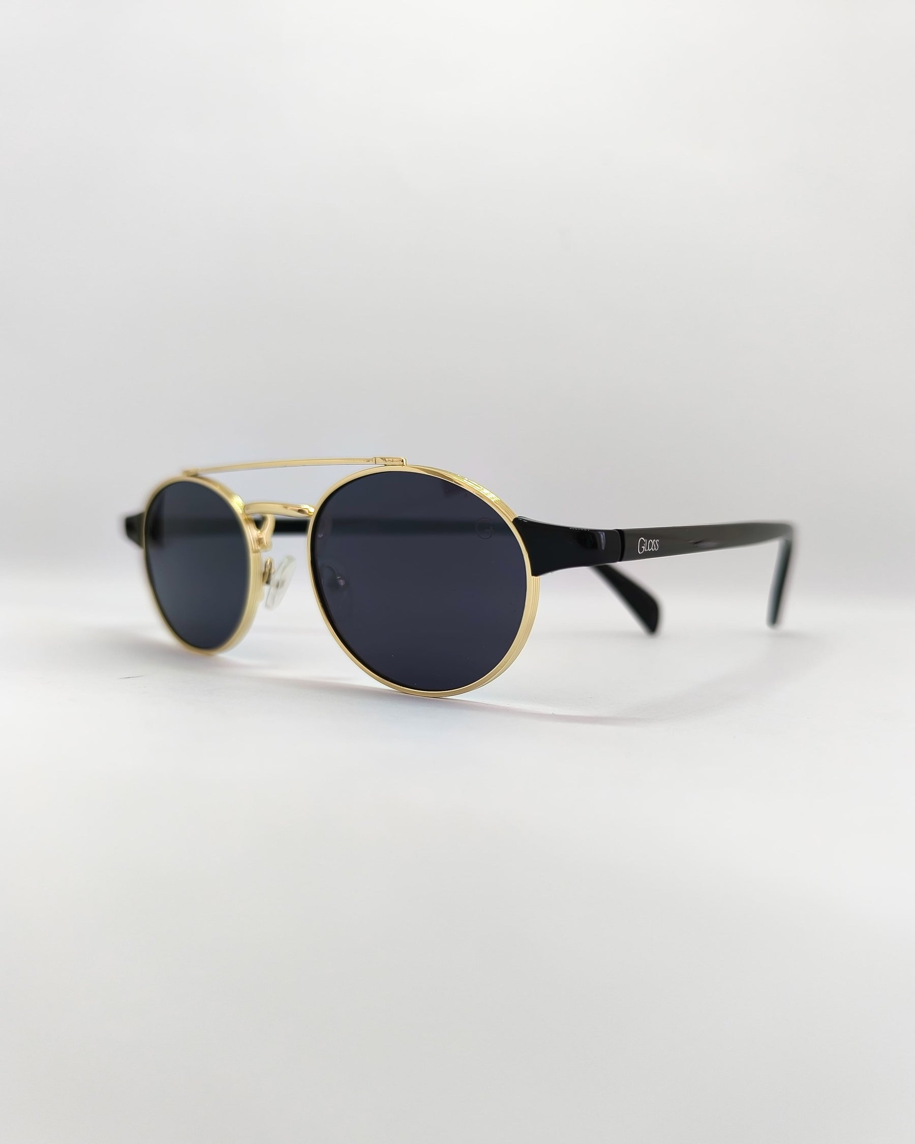 Óculos de Sol Unissex Oval Pequeno em Metal – Minimalista e Elegante