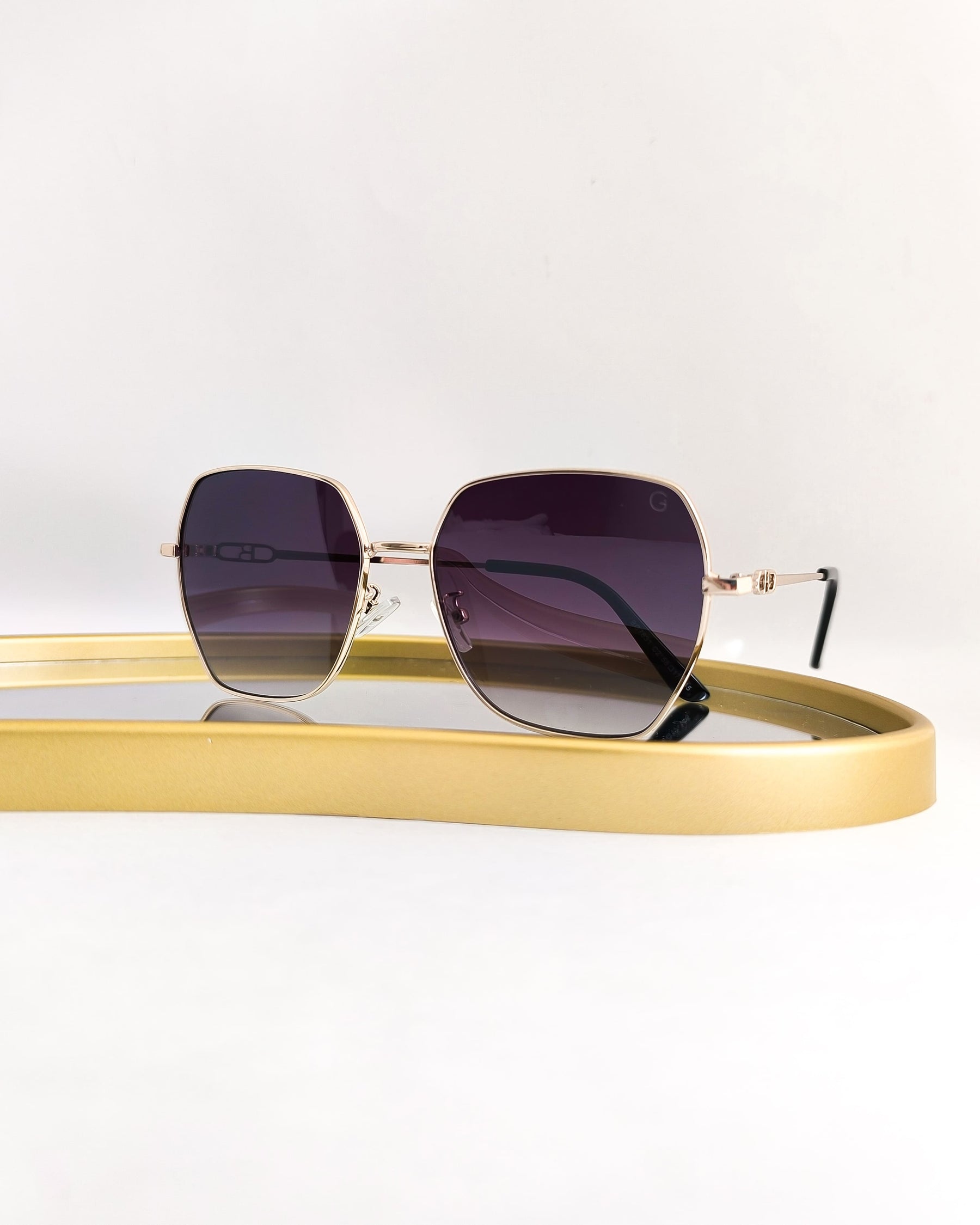 Óculos de Sol Feminino Quadrado Grande Sem Aro com Haste em Metal Dourado – Gloss